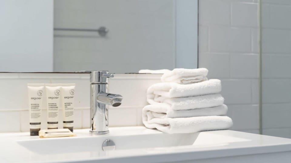 Fresh towels provided for a comfortable and refreshing stay.