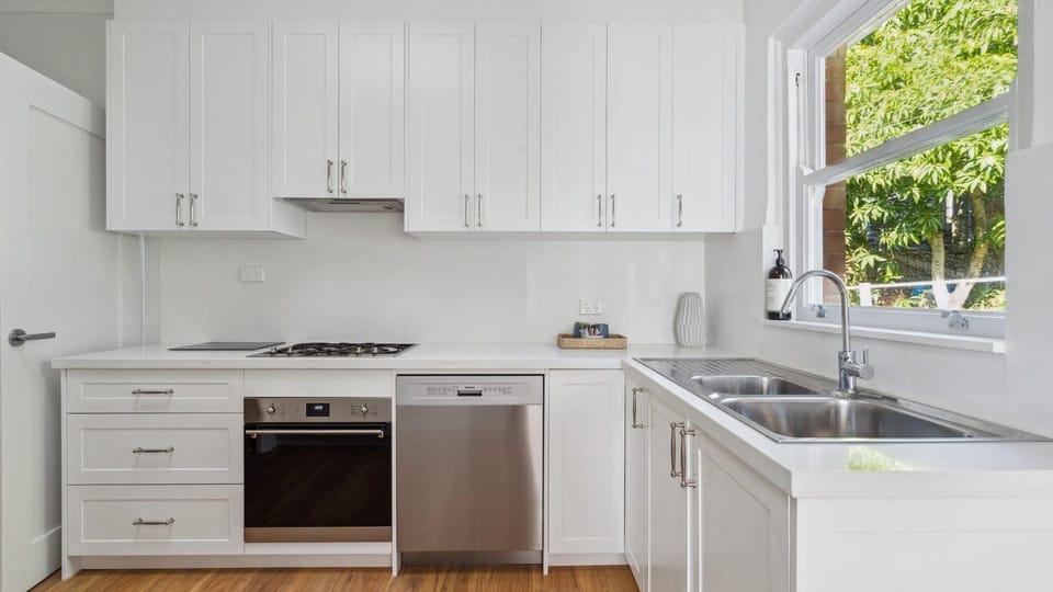 Functional kitchen perfect for home-cooked meals.