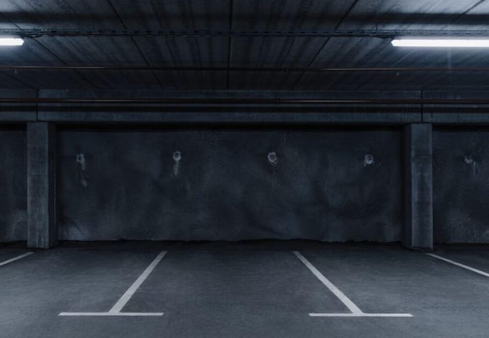 Designated car parking space within apartment building