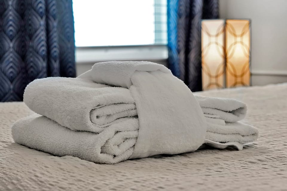 Every bed is neatly made with crisp linens and fresh towels