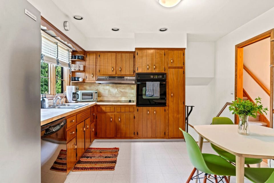 Updated kitchen with full-size appliances and generous cabinet storage.