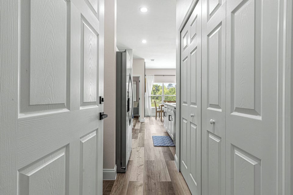 Laundry is located behind closet doors. Some Laundry pods are provided.