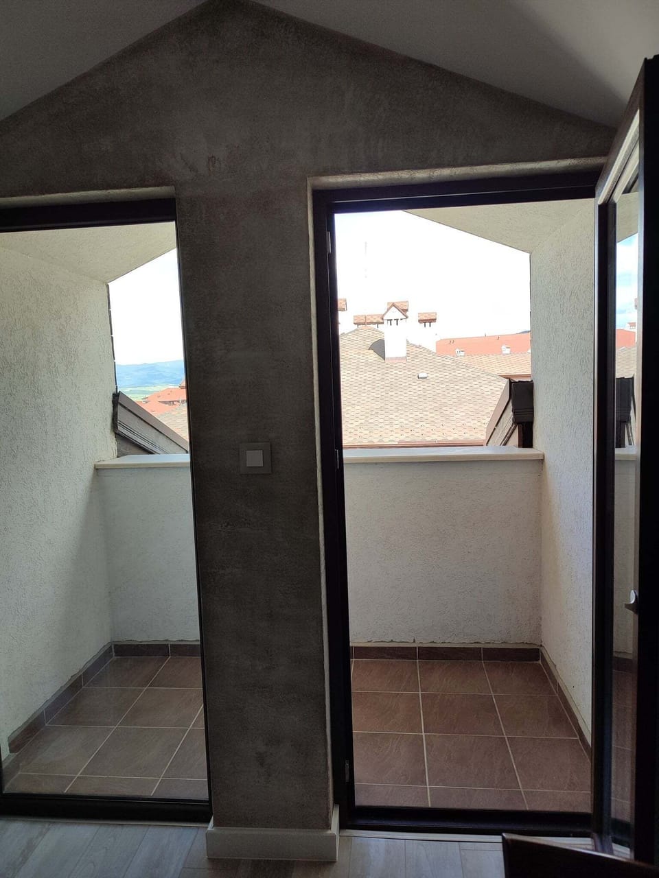 View of the balcony from the kitchen table.
