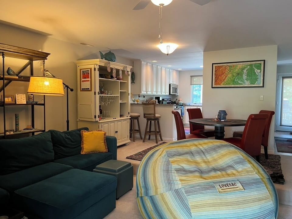 View of living room, dining area, and kitchen 