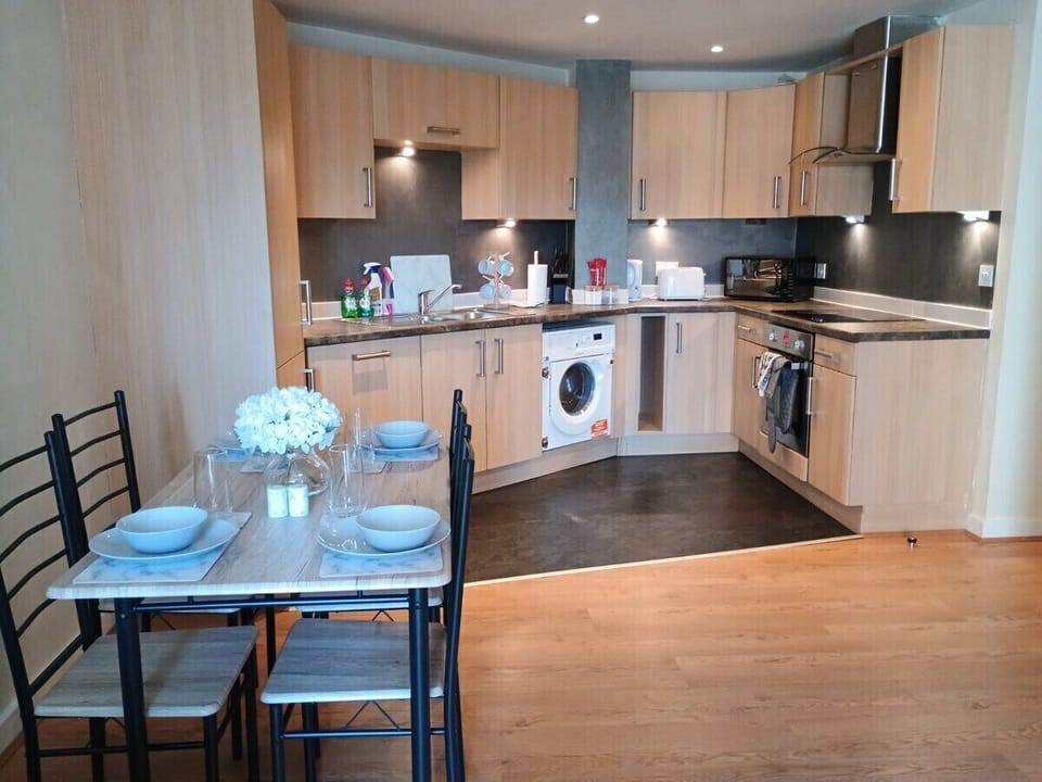Enjoy the convenience of a fully equipped kitchen, featuring modern appliances, ample counter space, and all the essentials you need to prepare meals during your stay. It's perfect for cooking up a feast or simply enjoying a quick snack.