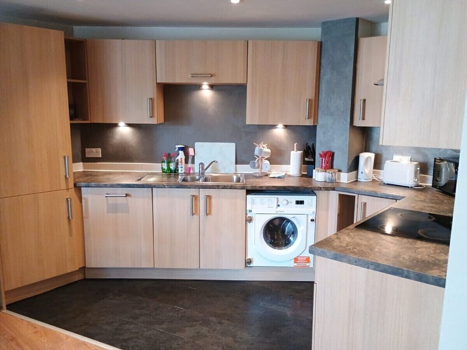 Enjoy the convenience of a fully equipped kitchen, featuring modern appliances, ample counter space, and all the essentials you need to prepare meals during your stay. It's perfect for cooking up a feast or simply enjoying a quick snack.