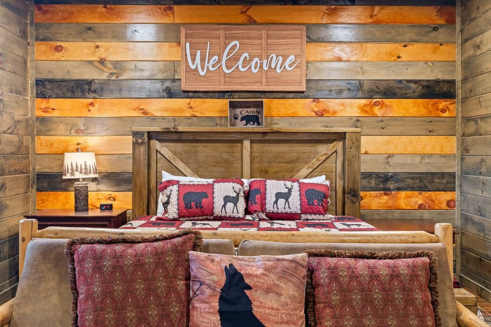 Bedroom 1 with king bed, Smart TV, deck, and ensuite