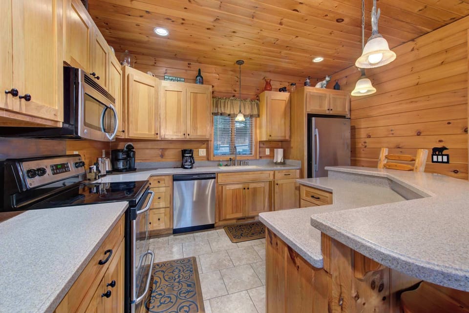 Sip morning coffee or grab a bite at the kitchen counter, with seating for 4