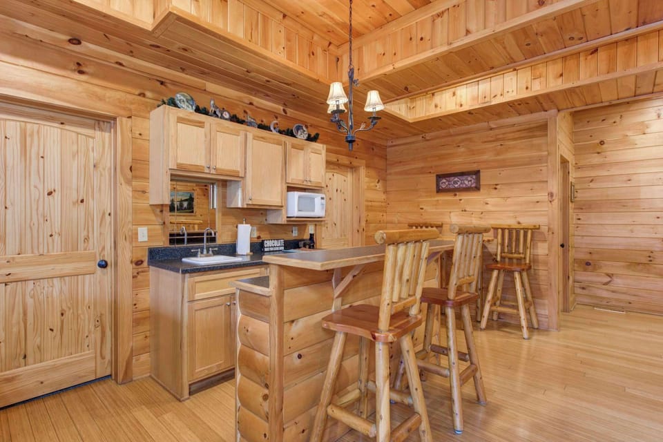 Recharge at the lower-level kitchenette counter between games