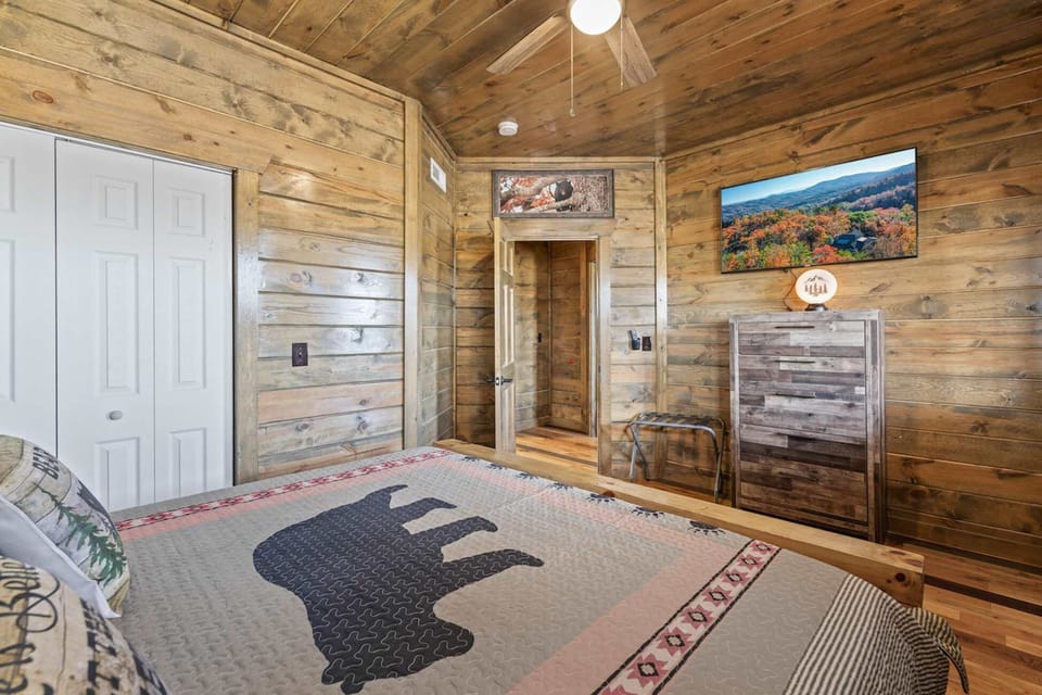 This king suite boasts a luxe private ensuite, Smart TV, & balcony access