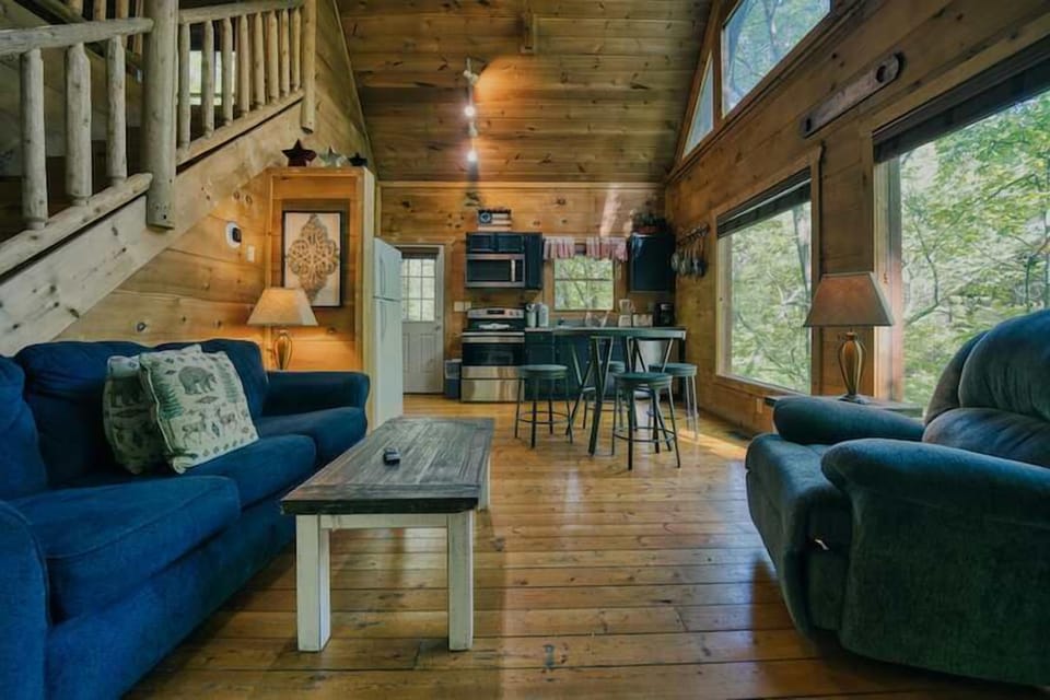 Curl up in the airy living room & stream your favorites by the fireplace