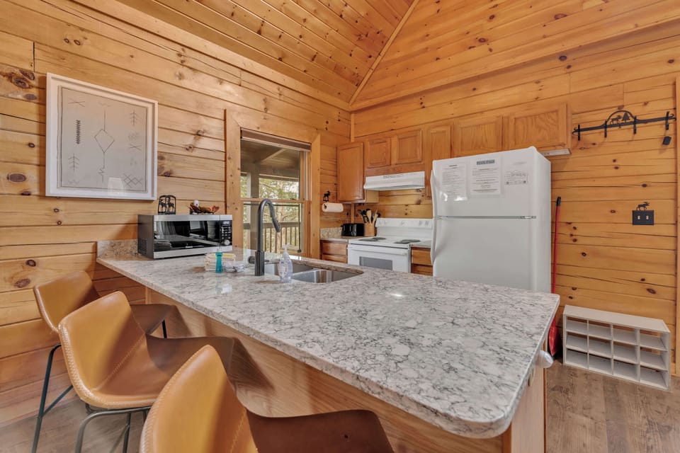 Counter seating and fully equipped kitchen
