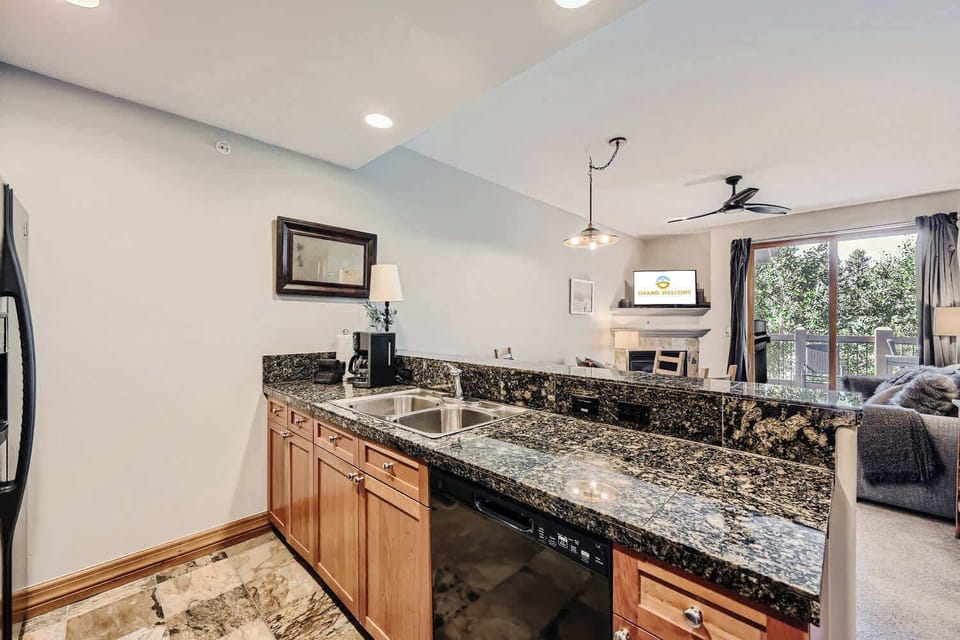 The open, airy kitchen offers ample space & all the comforts of home