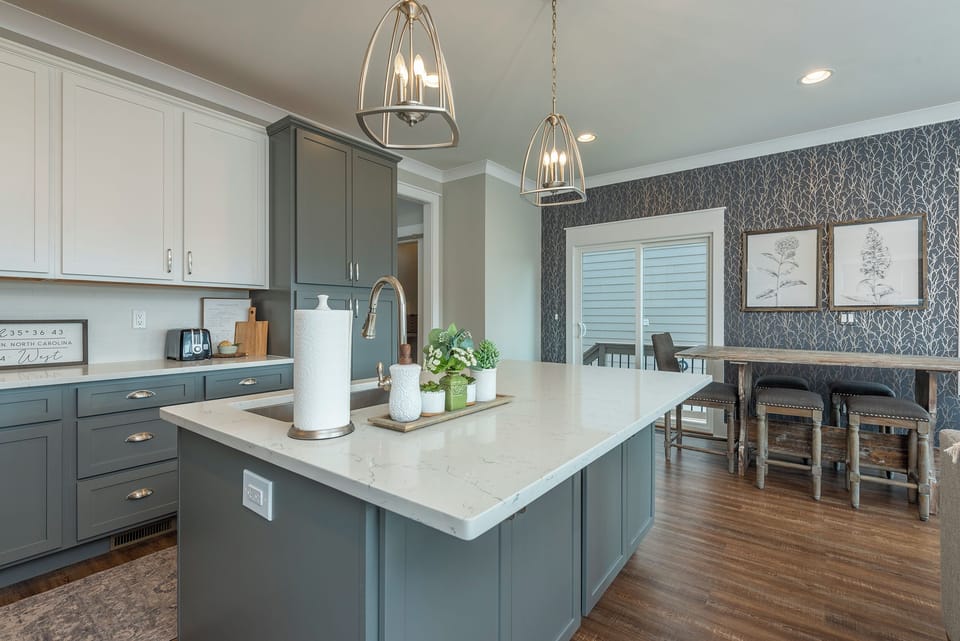 Kitchen with gas range, dishwasher, and two types of coffee makers (standard drip-style and Keurig).