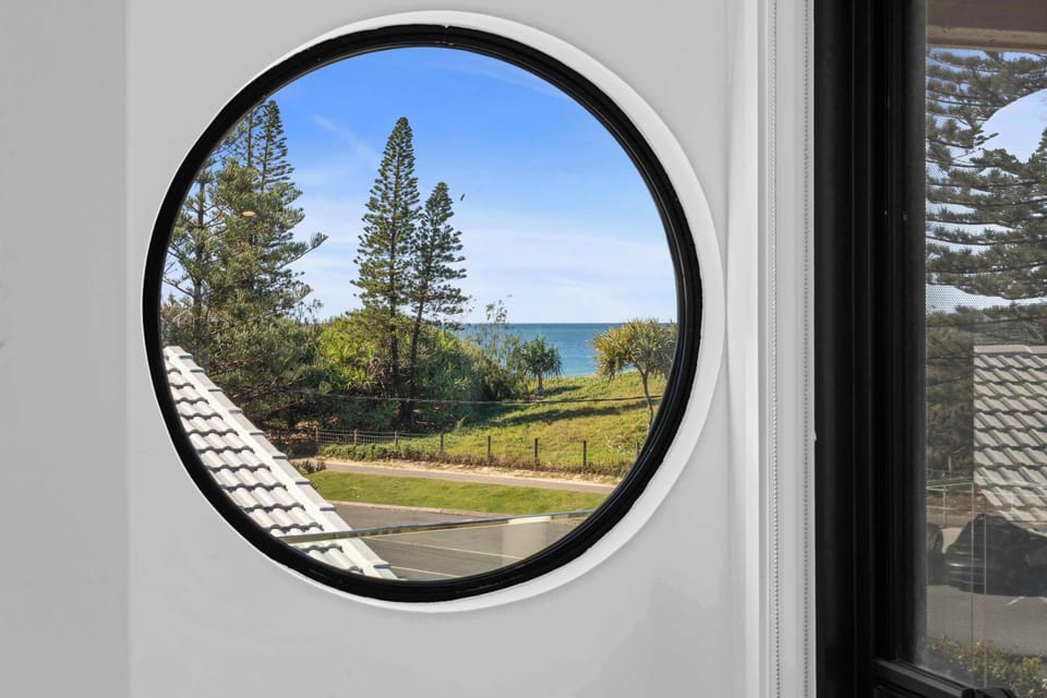 Unique circular design frames a perfect coastal outlook.
