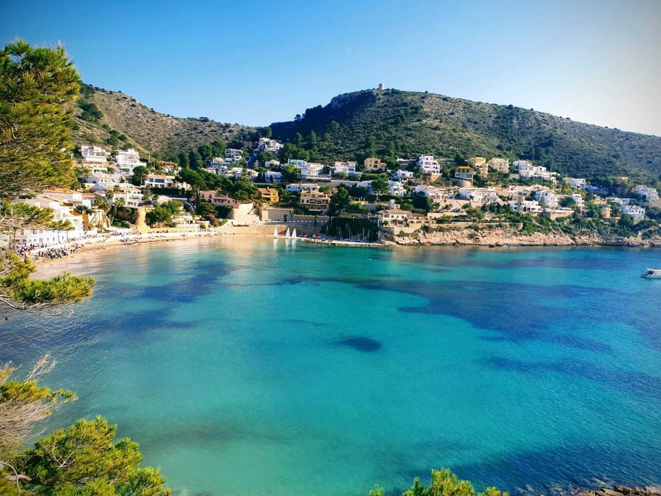 El Portet surrounded by villas and  restaurants