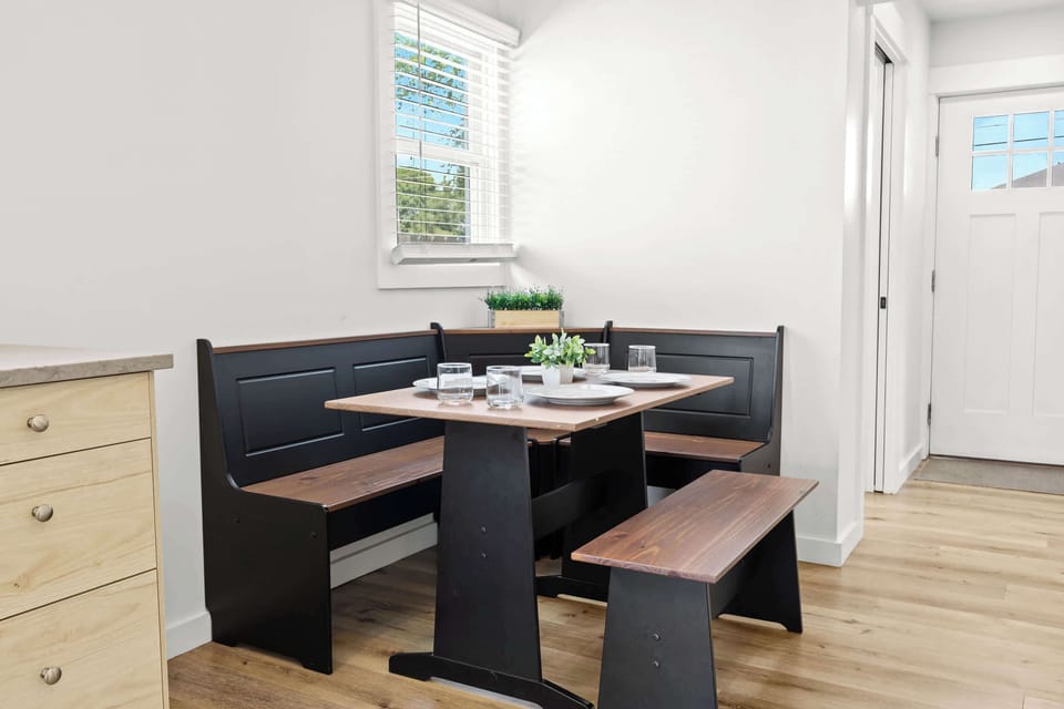 Dining Area: Gather around this stylish dining area — the perfect spot for shared meals, meaningful conversations, and making memories during your stay.