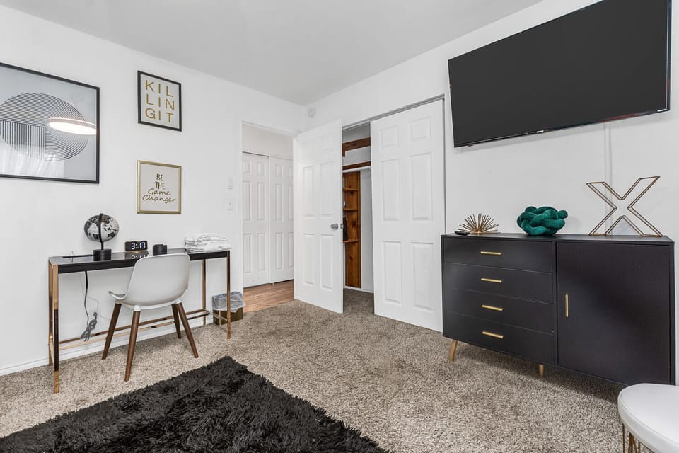Bedroom with desk area