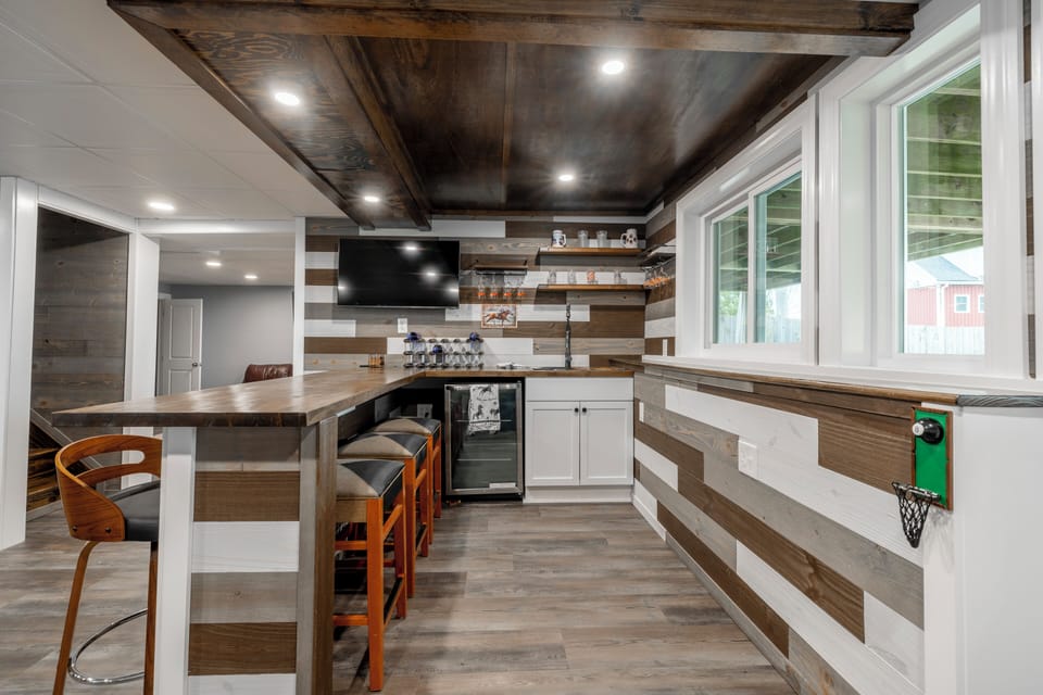 Wet Bar with Sonos speakers and a mini fridge and sink