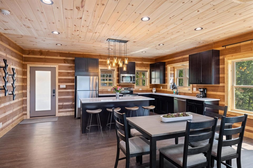 Dining area with 6 seats at the table and 4 seats at the kitchen island!