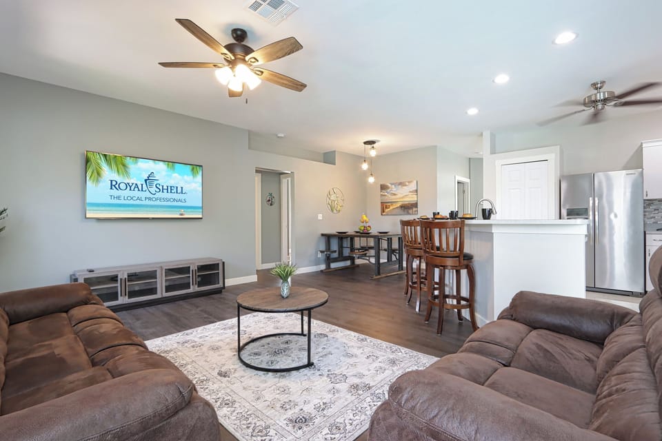 Living area with reclining sofa and loveseat