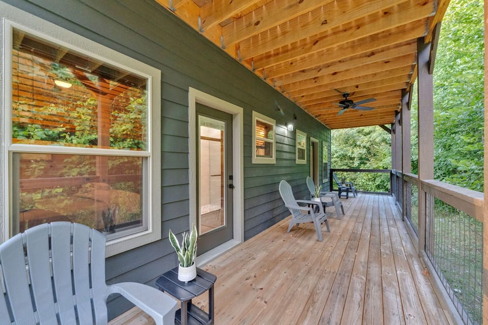 Cozy covered patio with a dining setup, ideal for relaxing.