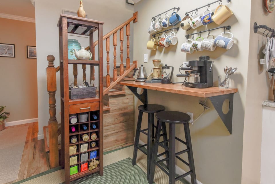 Lower level coffee bar has whole bean and ground coffee, pour over, French press