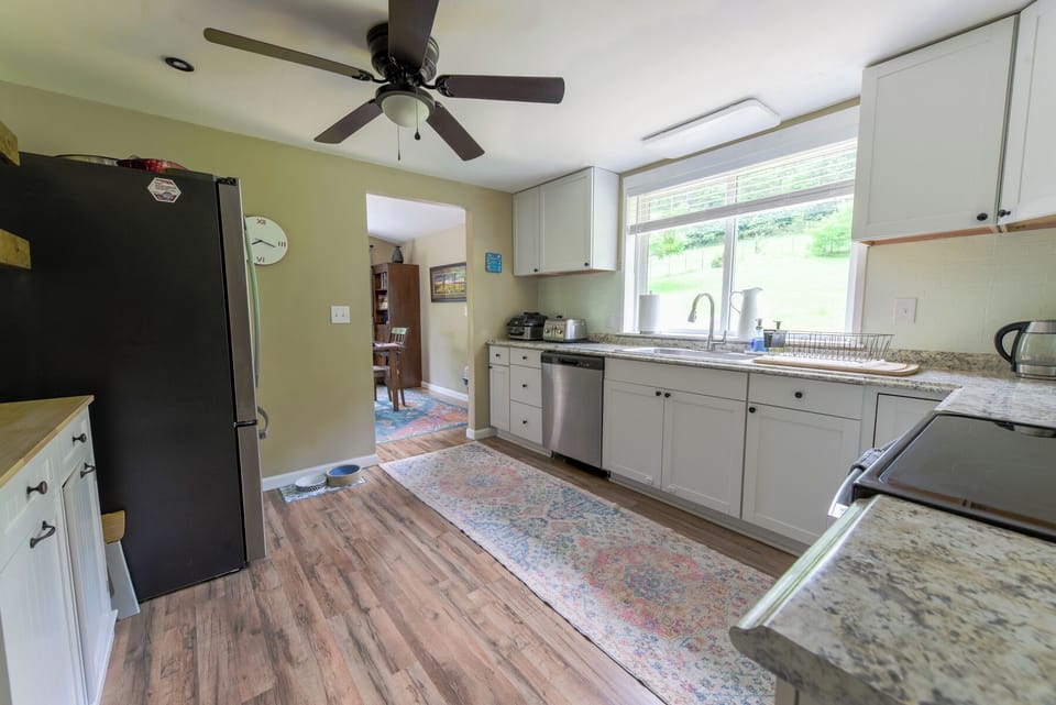 Upstairs kitchen joins to dining room for maximum efficiency