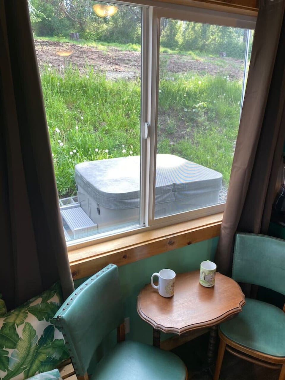 There`s the hot tub!  Right outside that window (but you might want to use the French doors going out to the deck.   ;-)