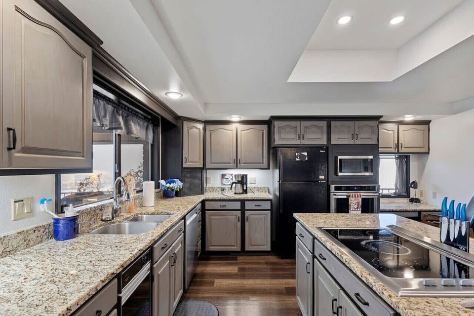 Full kitchen will cooktop, wall oven, microwave, dishwasher, etc.