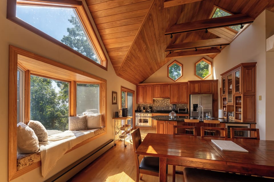 The expansive windows floods the room with daylight.