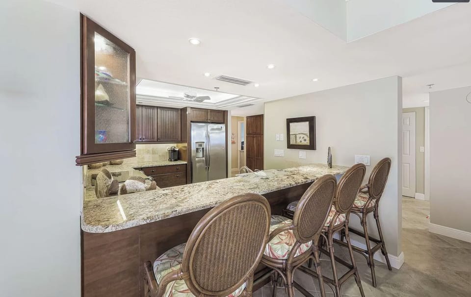 Great bar seating looking into kitchen