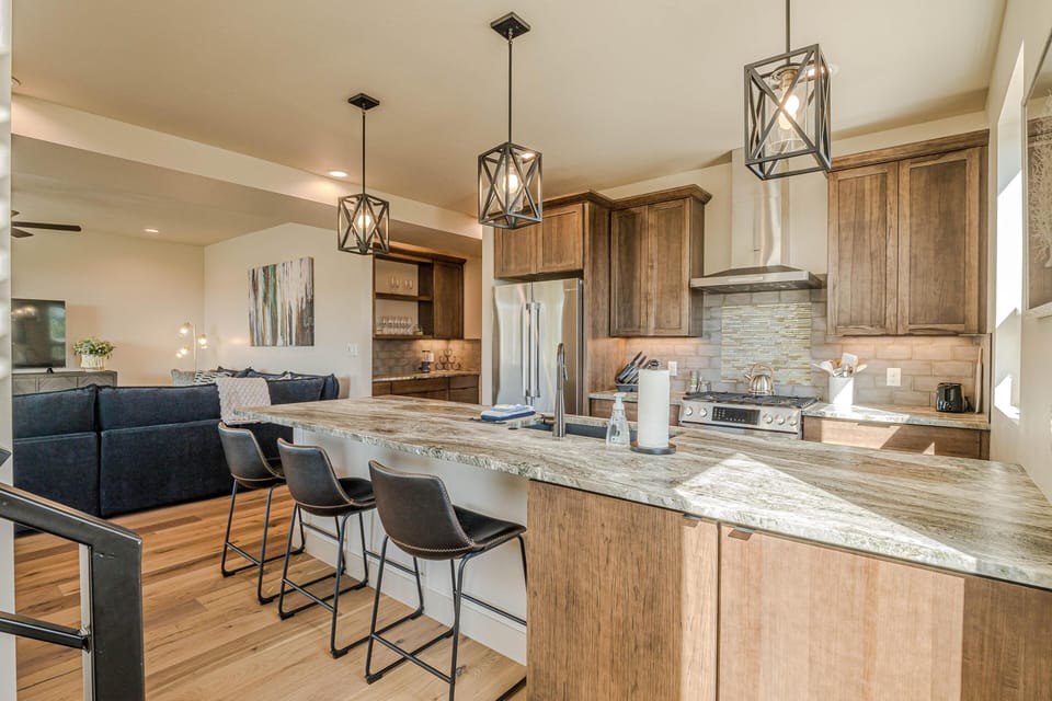 With ample counter space, additional bar seating, and abundant natural light, this space is perfect for gathering.