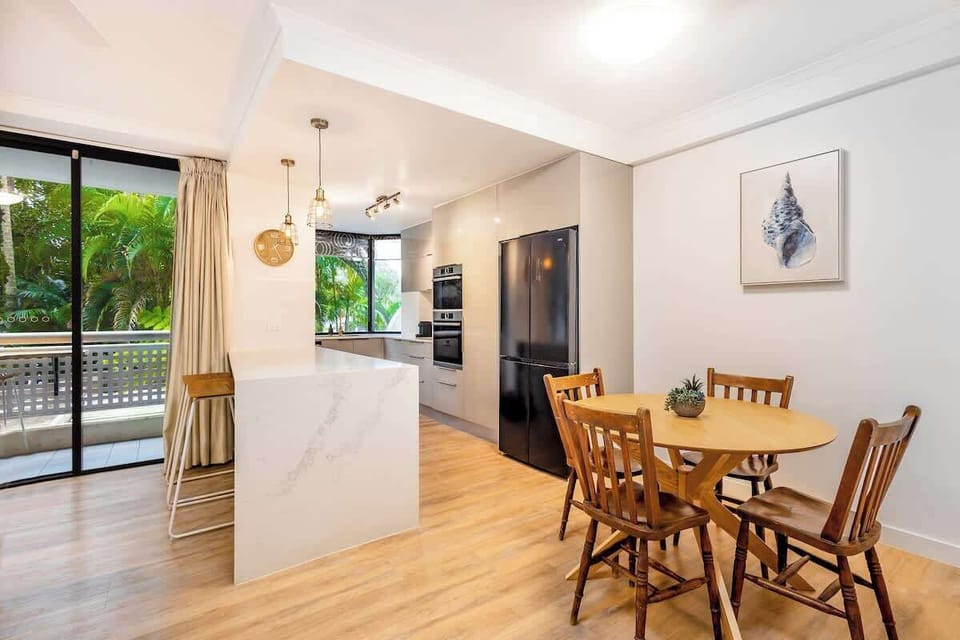Gather around the dining table for shared meals, a morning coffee, or planning the day's adventures.