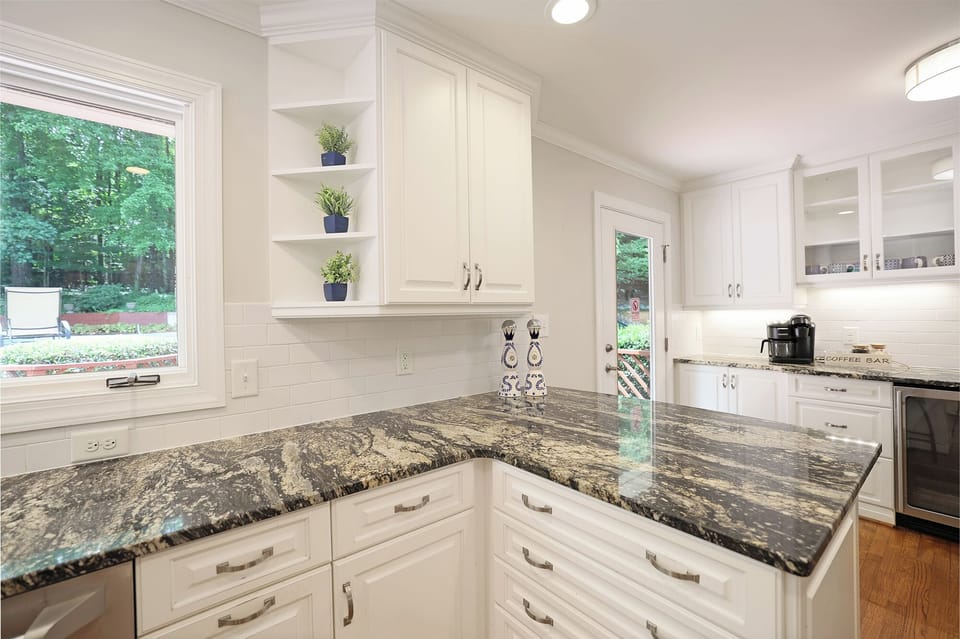 Kitchen with granite countertops galore