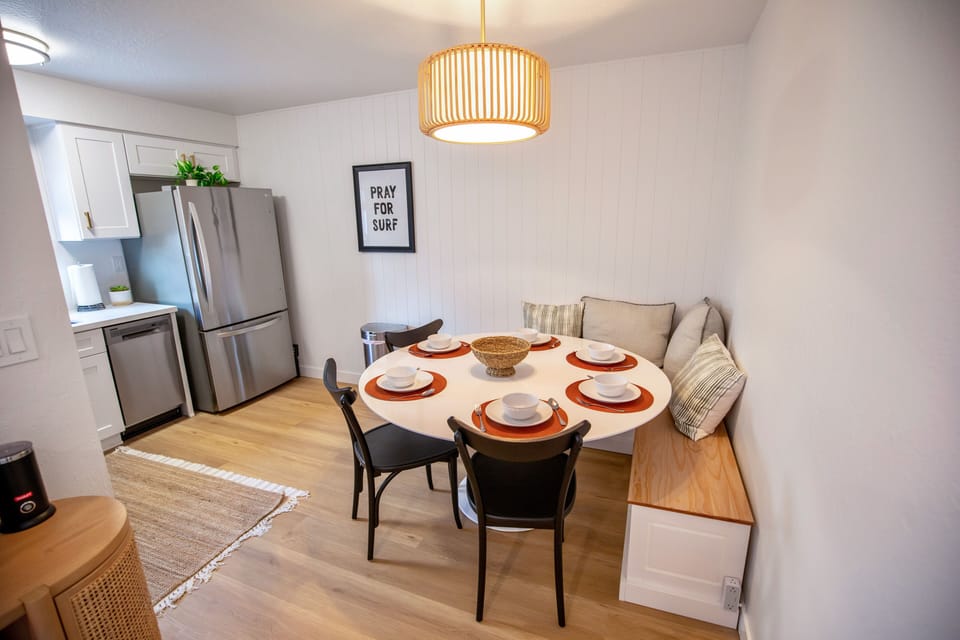 Inviting dining space that seats up to 6 guests. Cute corner bench and 3 chairs.