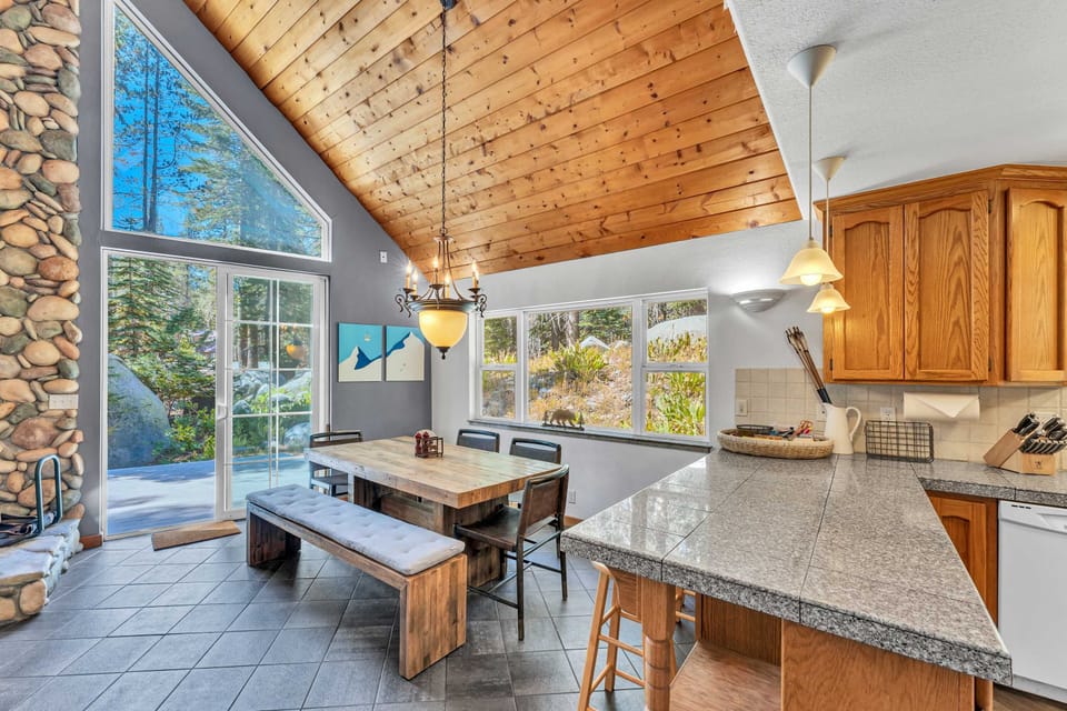 Kitchen and Dining Room: Well-equipped kitchen, Keurig, French Press, kitchen bar with 3 barstools, 9-person dining table