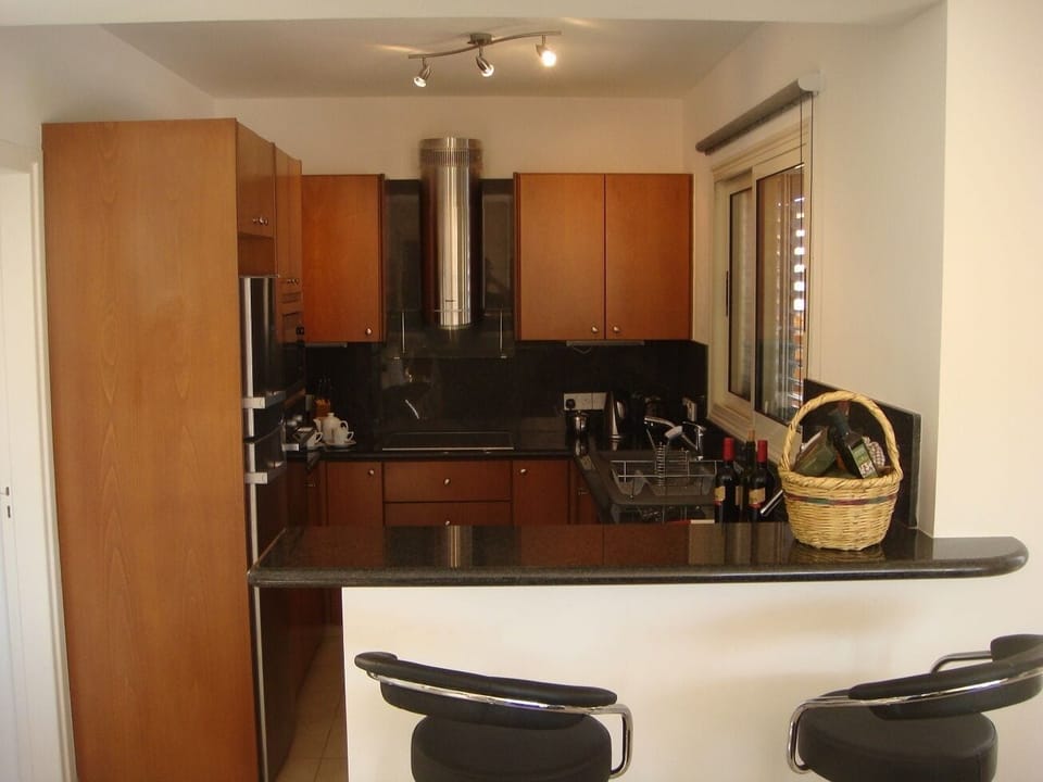 Kitchen with all appliances. Taken c 2012 (but has not changed since)