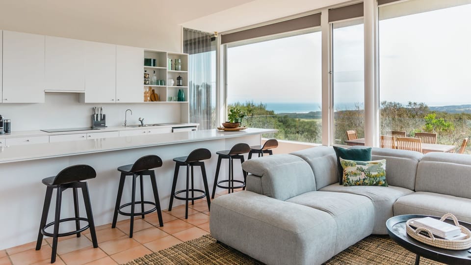 Open kitchen, living room, and wood fire, tv, outdside dining and bbq area