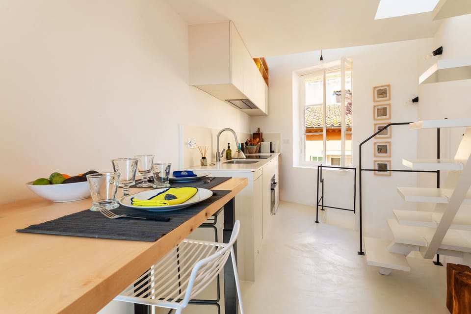 Bright kitchen with a warm, minimalist dining area