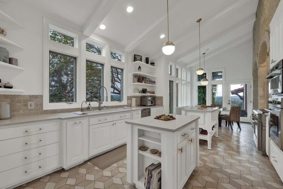 The natural light floods through the kitchen windows
