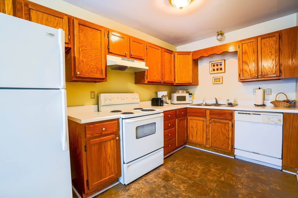 Kitchen with drip coffee maker, toaster, dishwasher, blender and more