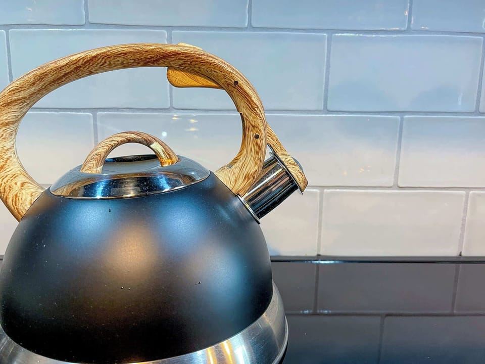 Kitchen with toaster, Keurig, kettle, blender and more