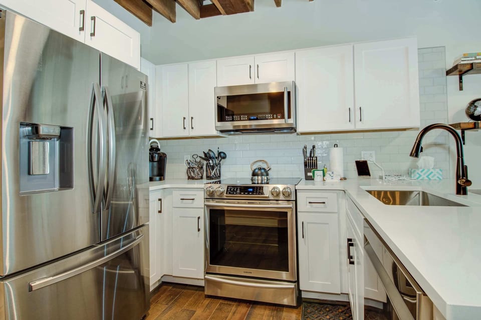 Kitchen with toaster, Keurig, kettle, blender and more