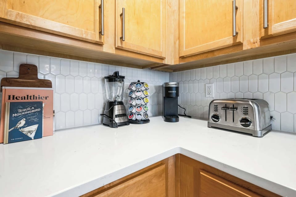 The kitchen is spacious & offers all the comforts of home