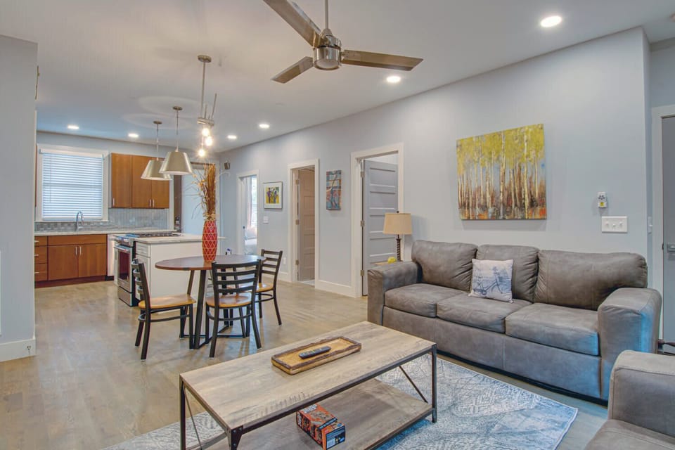 Open living area with Smart TV & table for 4