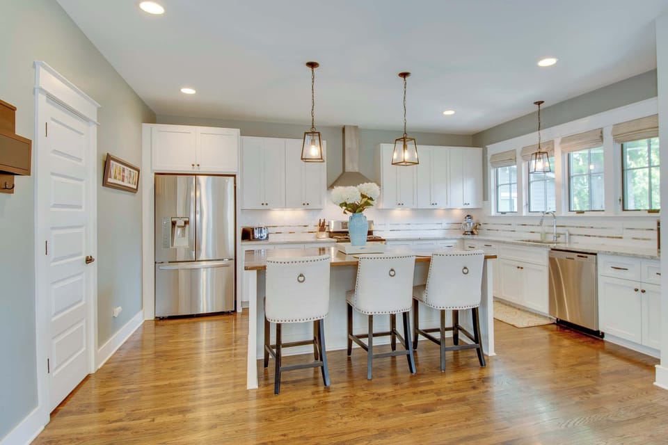 Kitchen with drip coffee maker, toaster, blender, stand mixer, and more