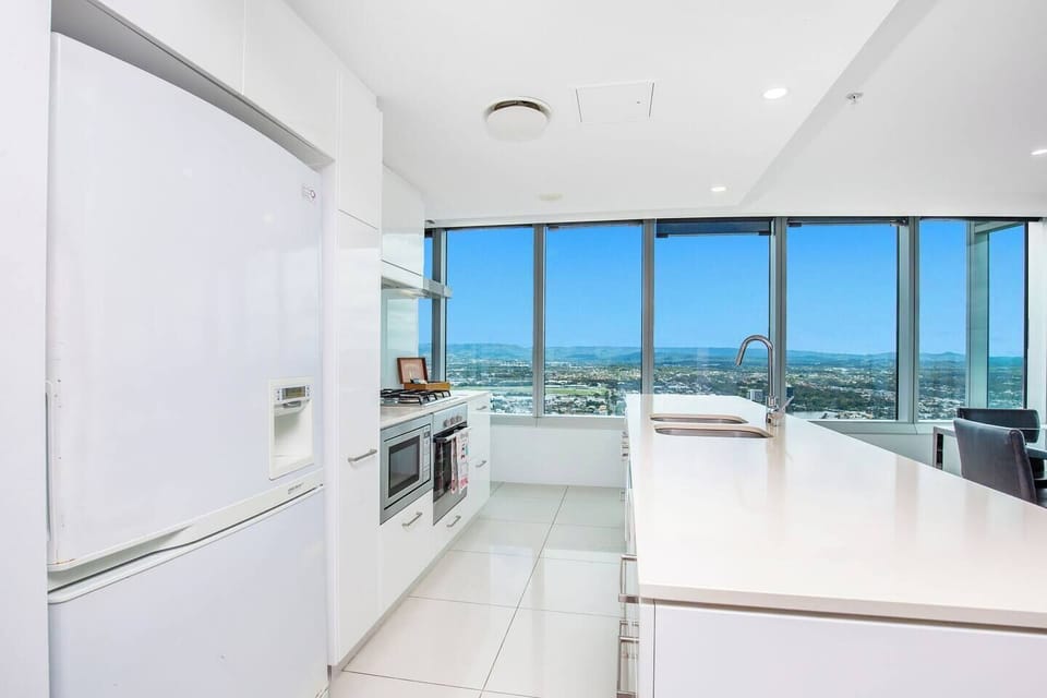 The sleek kitchen has everything you'll need to whip up a meal at home.