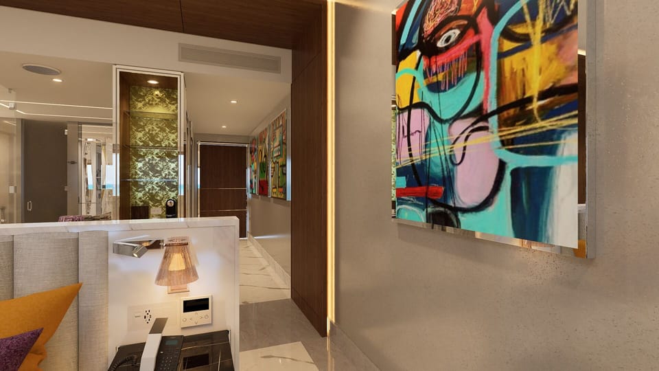 Luxury suite with bold artwork and modern décor at Hotel Mousai Cancun.