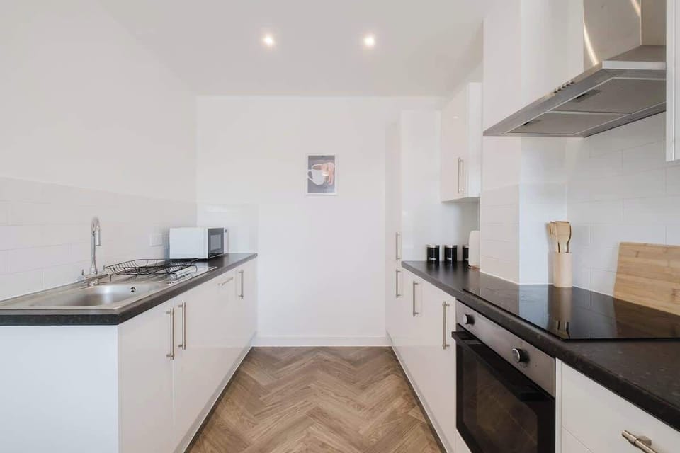 Enjoy the convenience of a modern kitchen equipped with all the essentials—perfect for preparing meals and entertaining guests
